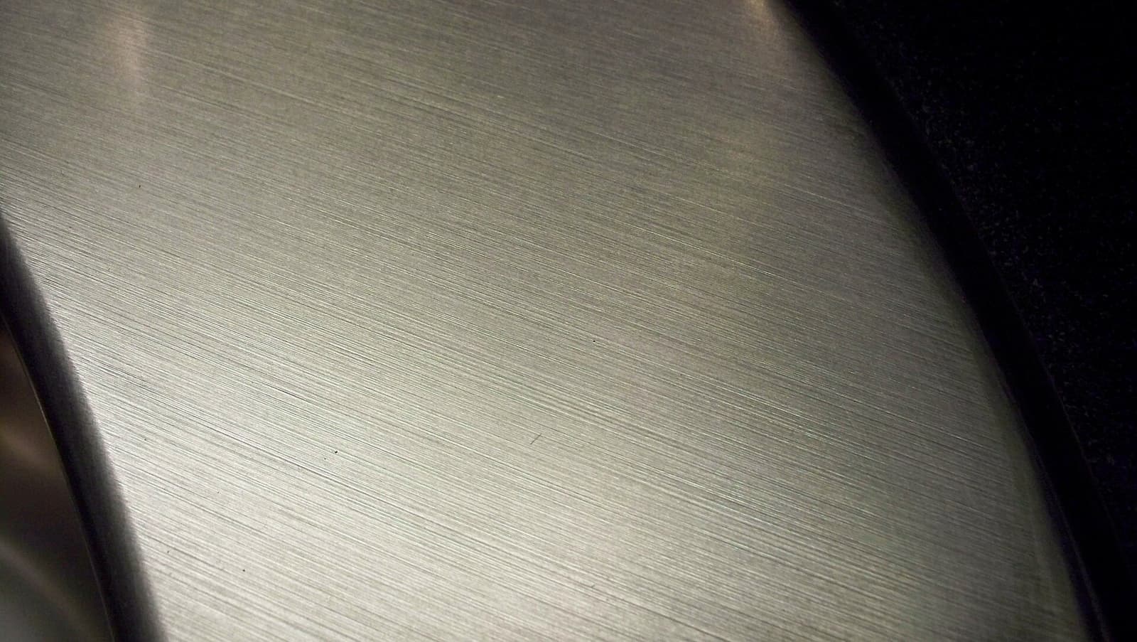 Brushed metal texture typical of indoor ferritic sheet