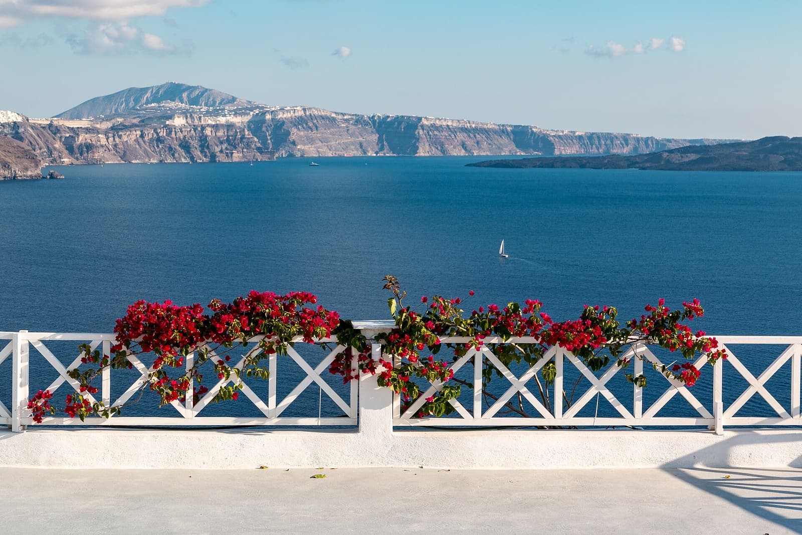 A coastal railing in bright salt light